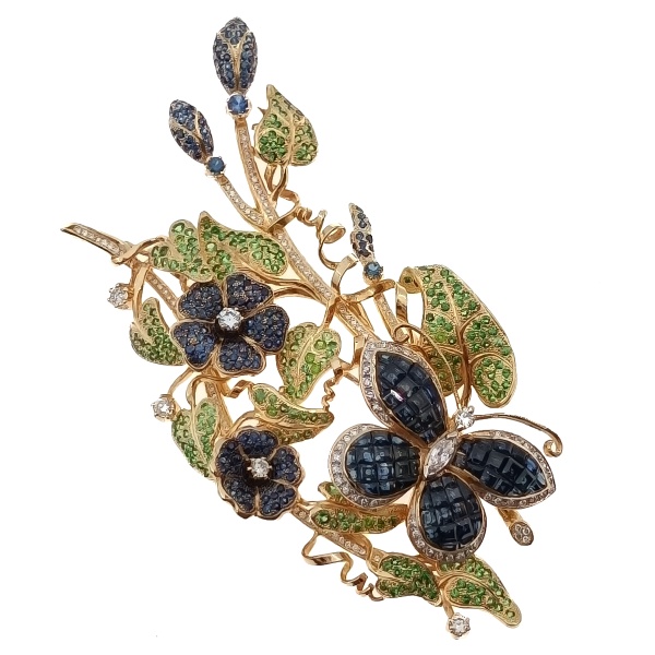 Брошь из золота 750 пробы с бриллиантами, корундом